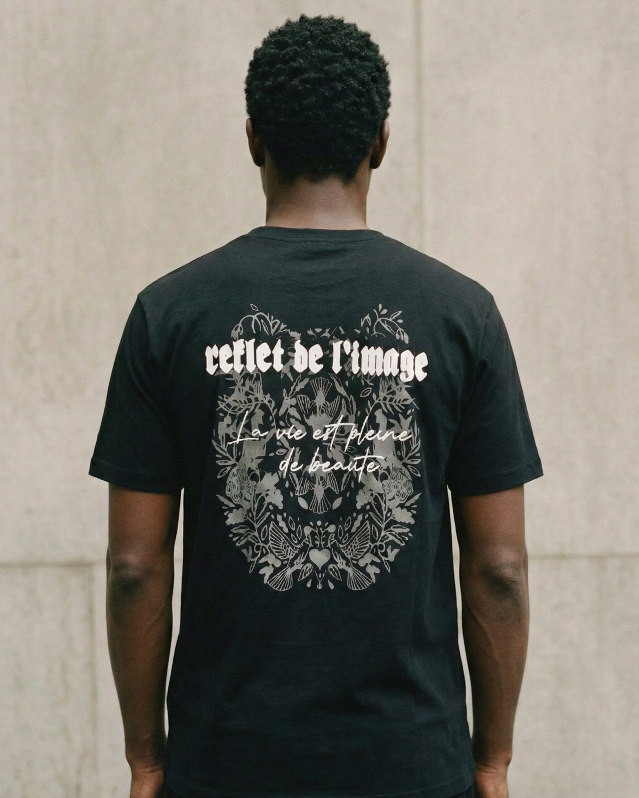 Reflect The Image Black Tee with graphic print design