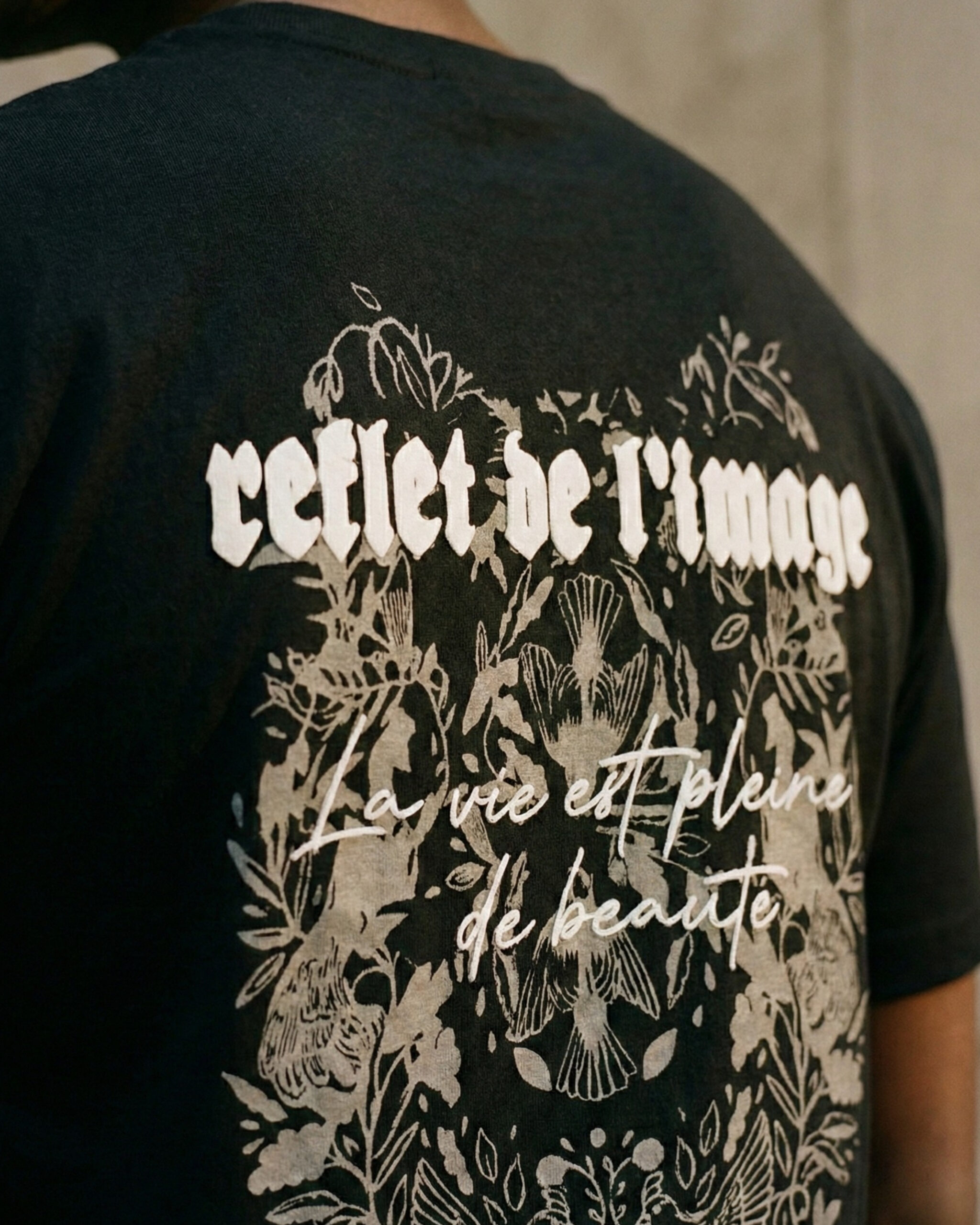 Reflect The Image Black Tee with graphic print design