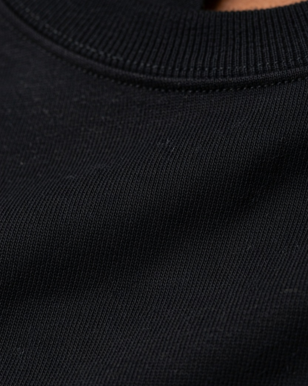 Essential Black Round Neck Tee with clean minimalist design
